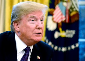 President Donald Trump makes remarks as he signs a Section 201 action in the Oval Office, at the White House, on Jan. 23, 2018, in Washington, D.C. (Credit: Mike Theiler-Pool/Getty Images)
