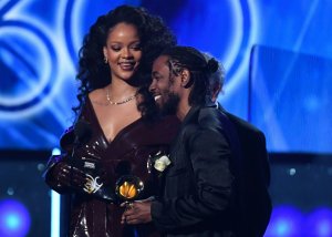 Rihanna and Kendrick Lamar receive the Grammy for Best Rap performance during the 60th Annual Grammy Awards show on Jan. 28, 2018, in New York. (Credit: Timothy A. CLARY/AFP/Getty Images)