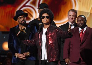 Bruno Mars receives his third Grammy for Album of the Year during the 60th Annual Grammy Awards show on Jan. 28, 2018, in New York. (Credit: Timothy A. Clary/AFP/Getty Images)