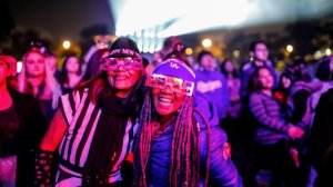 Maria De Leon, left, and Debra Randall celebrate New Year's Eve at Grand Park. (Credit: Marcus Yam / Los Angeles Times)