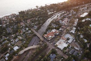 This undated photo shows mud, water and debris clog the 101 Freeway at the Olive Mill Road overpass in Montecito. (Credit: Al Seib / Los Angeles Times)