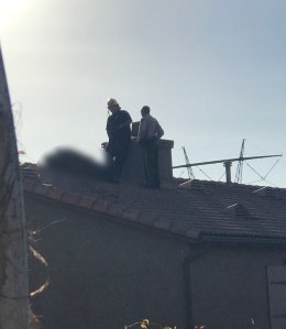 A blurred photo shows a skydiver who landed on the roof of a Perris home on Jan. 22, 2018. (Credit: Ali and Iryna Muhassen)