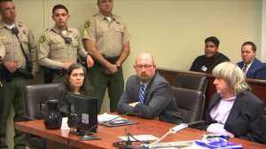 Louise Turpin, seated at left, and David Turpin, seated at right, appeared at their arraignment in Riverside on Jan. 18, 2018. (Credit: pool)
