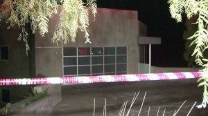 The home was red-tagged and cordoned off with tape warning people to keep out. (Credit: KTLA)
