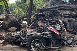 The mangled wreckage of a car that was swept away by floodwaters in Montecito on Jan. 9, 2018, is seen in this photo. (Credit: Mike Eliason / Santa Barbara County Fire Department)