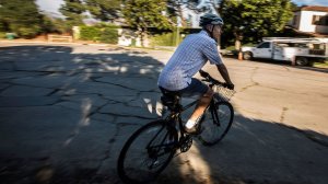 Patrick Pascal, who was injured after the back wheel of his bicycle got trapped in a crack on Griffith Park Boulevard, sued the city over his crash and settled for $200,000. He is shown in a photo taken in February 2018. (Credit: Maria Cardona / Los Angeles Times)