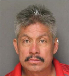 Maximino Delgado, 52, is seen in a booking photo released by the Fullerton Police Department on Feb. 17, 2018.