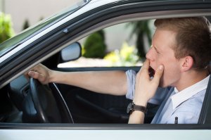 A drowsy driver is seen in this file photo. (Credit: iStock / Getty Images Plus)