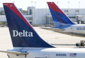 Tails of two Delta Air Lines jets are seen on Sept. 17, 2004 at O'Hare International Airport in Chicago, Illinois. (Credit: Tim Boyle/Getty Images)