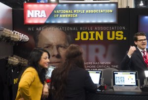 Attendees visit the National Rifle Association (NRA) booth during the annual Conservative Political Action Conference (CPAC) 2016 at National Harbor in Oxon Hill, Maryland, outside Washington, March 3, 2016. (SAUL LOEB/AFP/Getty Images)