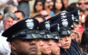 Recruits attend their graduation ceremony at Los Angeles Police Department Headquarters on July 8, 2016. (Credit: Frederic J. Brown / AFP / Getty Images)