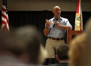 Rep. Brian Mast, R-Fl, speaks during a town hall meeting at the Havert L. Fenn Center on Feb. 24, 2017 in Fort Pierce, Florida. (Credit: Joe Raedle/Getty Images)