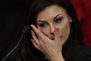 Jamie Dantzscher, former gymnast and 2000 Olympic bronze medalist, wipes away tears while testifying before the Senate Judiciary Committee about her sexual abuse at the hands of doctor Larry Nassar during a hearing in the Dirksen Senate Office Building on Capitol Hill, March 28, 2017. (Credit: Chip Somodevilla / Getty Images)