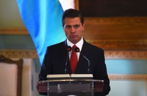 Mexican President Enrique Pena Nieto speaks at a ceremony at the presidential palace in Asuncion on Jan. 18, 2018, during a two-day visit to Paraguay. (Credit: NORBERTO DUARTE/AFP/Getty Images)