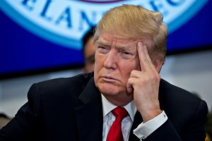 President Donald Trump listens while participating in a Customs and Border Protection roundtable discussion, Feb. 2, 2018, in Sterling, Virginia. (Credit: Andrew Harrer / Getty Images)