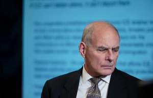 White House Chief of Staff John Kelly is seen as President Donald Trump attends a meeting at the Customs and Border Protection National Targeting Center in Sterling, Virginia, on Feb. 2, 2018. (Credit: Mandel Ngan / AFP / Getty Images)
