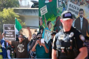 Counter-demonstators chant during a "Patriot Picnic" demonstration at Chicano Park in San Diego on Feb. 3, 2018. (Credit: Sandy Huffaker / AFP / Getty Images)