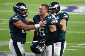 Jason Kelce #62, Brent Celek #87 and Zach Ertz #86 of the Philadelphia Eagles celebrate Ertz's 11 yard touchdown against the New England Patriots during the fourth quarter in Super Bowl LII at U.S. Bank Stadium on February 4, 2018 in Minneapolis, Minnesota. (Credit: Gregory Shamus/Getty Images)