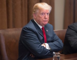 President Donald Trump hosts a law enforcement roundtable on MS-13 at the White House on Feb. 6, 2018. (Credit: Chris Kleponis / Getty Images)
