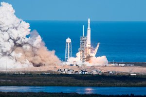 The SpaceX Falcon Heavy takes off from Pad 39A at the Kennedy Space Center in Florida, on Feb. 6, 2018, on its demonstration mission. (Credit: JIM WATSON/AFP/Getty Images)