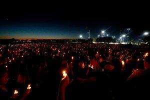 Thousands of mourners attend a candlelight vigil for victims of Marjory Stoneman Douglas High School shooting in Parkland, Florida on Feb. 15, 2018. (Credit: RHONA WISE/AFP/Getty Images)