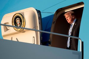 Donald Trump arrives at Palm Beach International Airport in West Palm Beach, on Feb. 16, 2018. (Credit: Jim Watson/AFP/Getty Images)