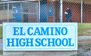 A man is seen walking on the campus of El Camino High School in South Whittier on Feb. 21, 2018, after a threat by a student was overheard by a school safety officer. (Credit: Frederic J. Brown / AFP / Getty Images)