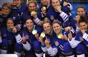 The U.S. team celebrate after defeating Canada in a shootout in the Women's Gold Medal Game on day thirteen of the PyeongChang 2018 Winter Olympic Games at Gangneung Hockey Centre on February 22, 2018 in Gangneung, South Korea. (Credit: Bruce Bennett/Getty Images)