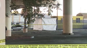 An investigation was underway after a person was set on fire in a Home Depot parking lot in Cypress Park on Feb. 1, 2018. (Credit: KTLA)