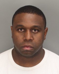 Alejandro Brown is seen in a booking photo released by Beaumont police on Feb. 21, 2018.