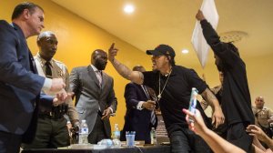 John Weber, center, older brother of Anthony Weber, yells at members of the Sheriff Civilian Oversight Commission during an emergency town hall meeting on Feb. 7, 2018 at the New Congregational Missionary Baptist Church in South L.A. (Credit: Kent Nishimura / Los Angeles Times)