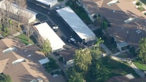 Authorities respond to a deputy-involved shooting in Laguna Woods on Feb. 6, 2018. (Credit: KTLA)