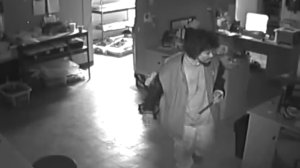 A man is seen going through a Van Nuys home business he broke into just before he was caught watching porn on the home computer, the family who lives there told KTLA on Feb. 13, 2018. (Credit: Mirizzi Family)
