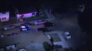 A car is seen being pursued by West Covina police before it reached the city of Compton just moments later, where the pursuit ended on the night of Feb. 12, 2018. (Credit: KTLA)