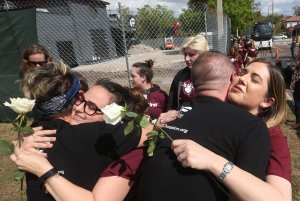 The Marjory Stoneman Douglas contingent (in burgundy) receives a warm welcome in Orlando on Feb. 28, 2018. (Credit: TNS via Getty Images)