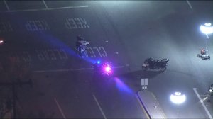 Police respond to a crash involving a CHP officer during a motorcade for Canadian Prime Minister Justin Trudeau in Simi Valley on Feb. 9. 2018. (Credit: KTLA)