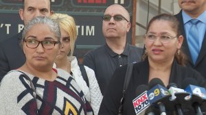 Melda and Virginia Martinez Bojorquez, front, are seen at an LAPD news conference on Feb. 1, 2018. (Credit: KTLA)