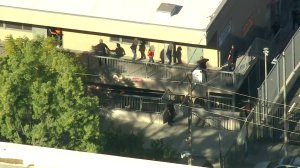 Students appear to be taken out of a classroom at Sal Castro Middle School after a shooting on Feb. 1, 2018. (Credit: KTLA)