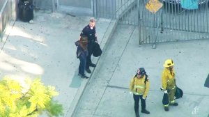 One person is detained following a shooting at a school in the Westlake District on Feb. 1, 2018. (Credit: KTLA)