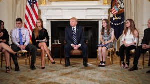 President Donald Trump takes part in a listening session on gun violence with teachers and students in the State Dining Room of the White House on February 21, 2018. (Credit: MANDEL NGAN/AFP/Getty Images)
