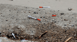 Discarded needles are seen in downtown Santa Ana in this undated photo. (Credit: Allen J. Schaben / Los Angeles Times)