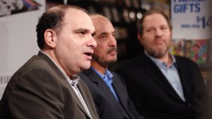 From left, Bob Weinstein joins Blockbuster Chairman and CEO John Antioco and Harvey Weinstein as the three speak with reporters at a press conference announcing The Weinstein Company's deal with Blockbuster Inc. for exclusive rights to rent theatrical movies and direct-to-video titles on Nov. 15, 2006, at Blockbuster in New York City. (Credit: Andrew H. Walker/Getty Images)