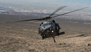 An HH-60G Pave Hawk helicopter assigned to the 66th Rescue Squadron flies during training on Nellis Air Force Base, Nevada, Feb. 22, 2018. (Credit: U.S. Air Force / Senior Airman Kevin Tanenbaum)