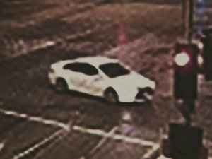A grainy photo released by police shows the Toyota Camry wanted in connection with the fatal hit-and-run.