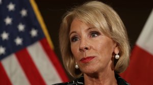 U.S. Education Secretary Betsy DeVos speaks to the news during a press conference held at the Heron Bay Marriott about her visit to Marjory Stoneman Douglas High School in Parkland, Fla., on March 7, 2018, in Coral Springs, Fla. (Credit: Joe Raedle/Getty Images)