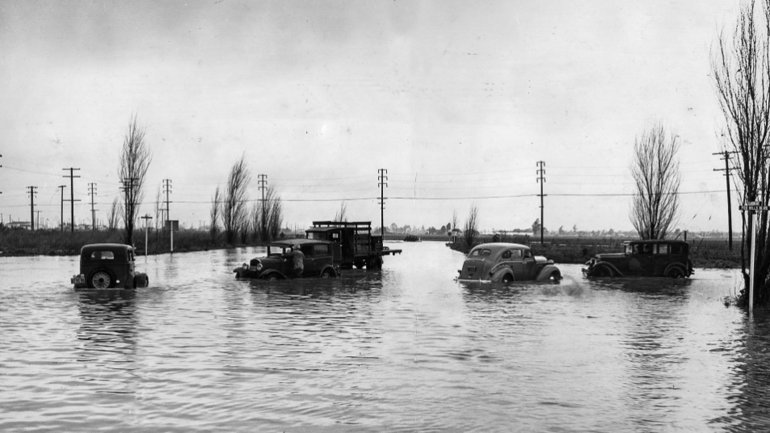 Autos stall in flooded Fox Hills Boulevard and Slauson Avenue after a storm brought about 4 inches of rain. This photo was published in the L.A. Times on March 1, 1938.