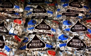 Bags of Hershey Kisses sit on a shelf at a store on Aug. 7, 2002 in Hershey, Pennsylvania. (Credit: Spencer Platt/Getty Images)