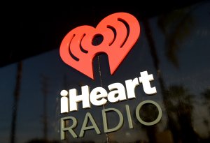 iHeartRadio logo is seen during the Coldplay iHeartRadio Album Release Party at the iHeartRadio Theater Los Angeles on May 16, 2014. (Credit: Jason Kempin/Getty Images for Clear Channel)