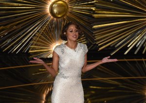 Stacey Dash presents on stage at the 88th Oscars on February 28, 2016 in Hollywood. (Credit: MARK RALSTON/AFP/Getty Images)