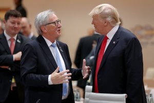 U.S. President Donald Trump, right, and European Commission President Jean-Claude Juncker chat at the G20 economic summit on July 8, 2017 in Hamburg, Germany. (Credit: Sean Gallup/Getty Images)